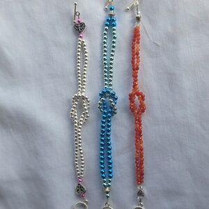 Resale Bundle! 3 Love Knot Hand Beaded Bracelets And 3 Pairs Of Mystery Earrings